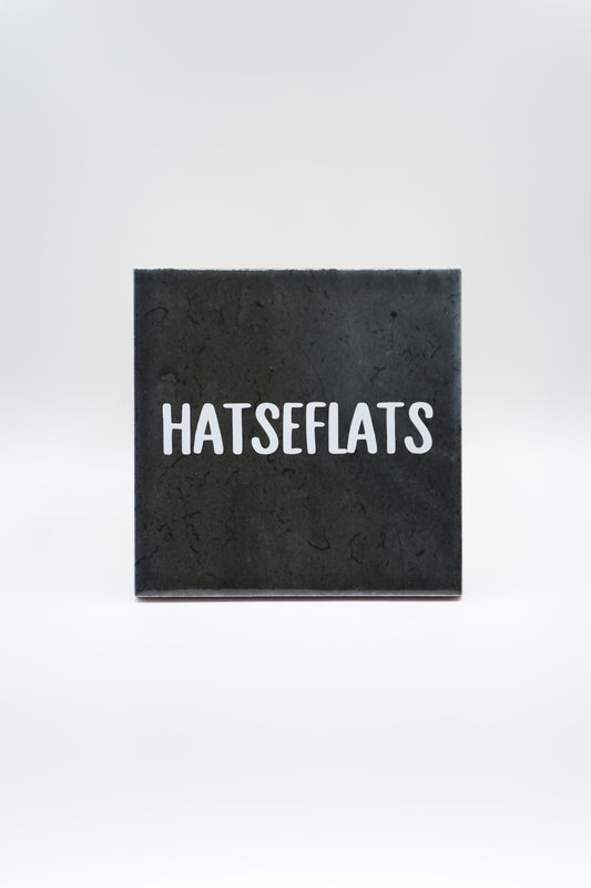 Hatseflats - zwart tegeltje 10x10